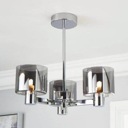 1e3cd48f6785e13471e95eb2bc56b4ae9d1807a634d5f6f51e0d6804916e5712.jpg An Image of Erin Ceiling 3 Light Smoked Ceiling Fitting Chrome