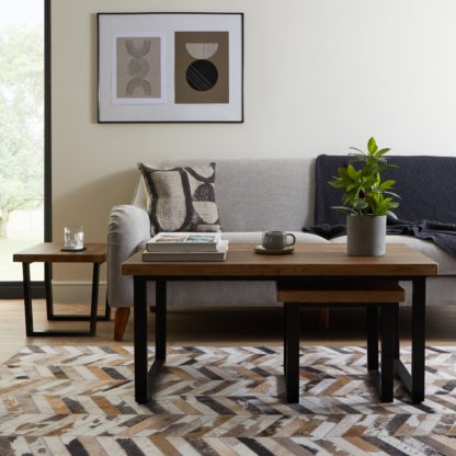 2c7146ff0cac089a7fe9c18abf0f36d593a2a59f3b024bb4a0e10651ec7fe16e.jpg An Image of Freddie Rustic Wood Effect Nest Coffee Table Dark Wood (Brown)