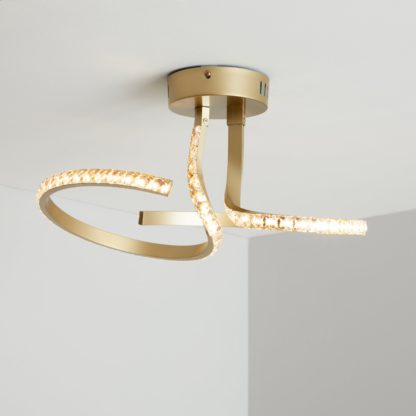 2e6fc0cf191690d745b6e7501f332afb97c99e23e270c25f48c36dff2038dec4.jpg An Image of Orion Integrated LED Gold Ceiling Fitting Gold
