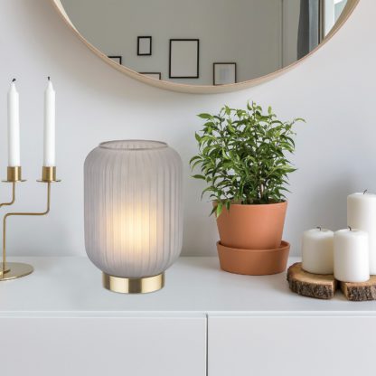 326239ff9ad7dd17447482f9a8c9fd6bebf2db1d156af7abb381a8fc34dc3957.jpg An Image of Pearl Frosted Table Lamp - Navy