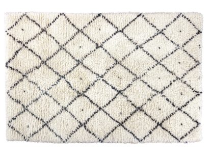 425d278ddd8df61a896b27825e6373d481899124af067930515a9d5bb82a20c0.jpg An Image of Habitat Berber Flatweave Wool Rug - 140x200cm - Cream