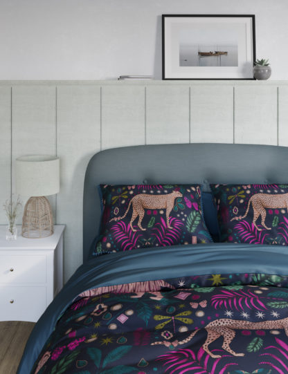 60fe409767fcdf31ebc44bde8abfad8a827643fb38977b2cca8e091cce9a5ed4.jpg An Image of M&S Pure Cotton Cheetah Pom Pom Bedding Set