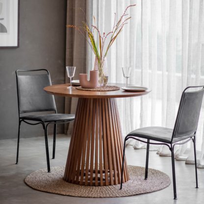 7e342e6ef4c4161fcb83632720a8570864098209ebb6748d320f24663aaf3c4b.jpg An Image of Dawson Slatted Dining Table Natural