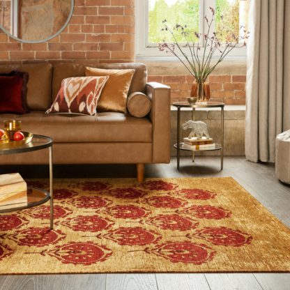 8323a77dc7f4600bd153b8dbbe3a2d11ccd9a270d4c28f314128a40062e73807.jpg An Image of Suman Chenille Flatweave Rug Old Gold