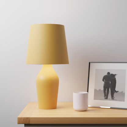 851415ad2fef0c4191b60856d12188d3d07085c88be50c8a613a692ae9c39777.jpg An Image of Ava Stoneware Graphite Table Lamp Grey