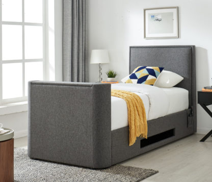 a2e222b1b54f98327ad7e27796201ec59f6e5a17f6df3a644fee9a81a843c21d.jpg An Image of Valencia Grey Fabric Electric TV Bed With 32" TV Included - 6ft Super King Size
