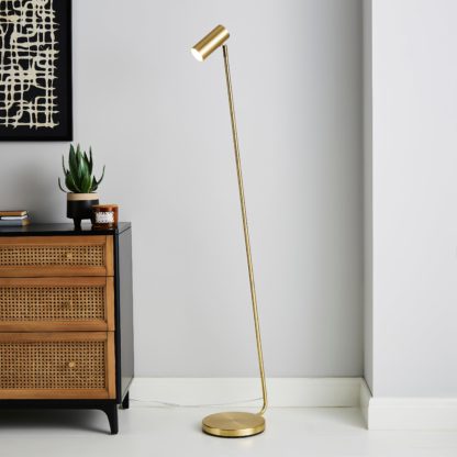 c76a061cae3d0a7f46c5f293f4ea1785e7bdb6e77393a1522c648d0b0ffa0e04.jpg An Image of Lilou Integrated LED Dimmable Floor Lamp Gold