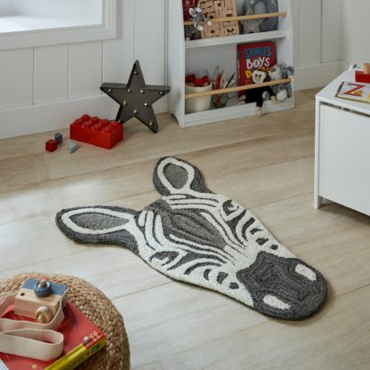 e1f61ced671d7e0bfd839de9a8aef4bcdf64e67a1bbfe23e01ab897ca3669cd9.jpg An Image of Zoe Zebra Face Rug Black/White