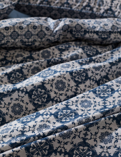 f7cc562fb6611c5e4690fe7e56825692b2b74799f95f954a7bf30dbf86066553-3.jpg An Image of M&S X Fired Earth Paris Isabelle Reversible Bedding Set