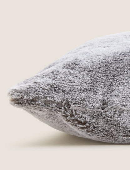 1767bdaaa63491803b19199d814ff842207b9e69a09eccea43bd1ae378a9a063-1.jpg An Image of M&S Faux Fur Cushion
