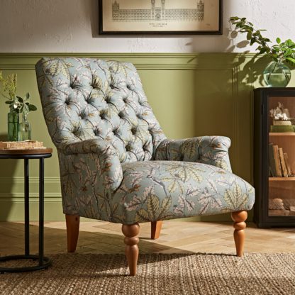 29d6230bb40c469758fafc7c65b178d54a20821acb975992592539a6218a567c.jpg An Image of Bibury Button Back Chair Arboretum Print Arboretum Print