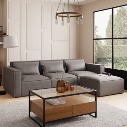 4ef9c6c49980fc649c21b743c96fe2ff00be1825ac4c8f140da91e8529128bae.jpg An Image of Modular Arne Tan Faux Leather Chaise Sofa Tan
