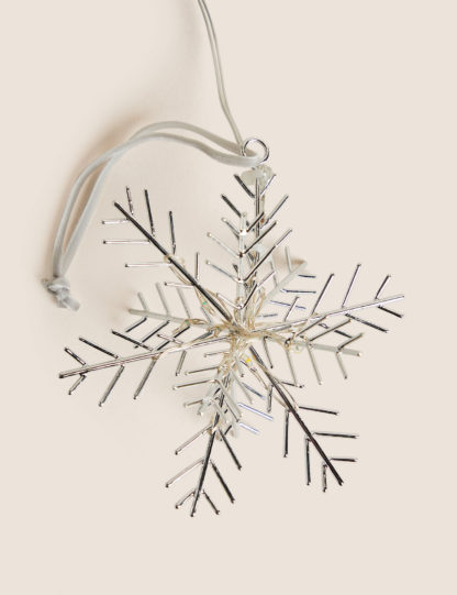 95507ba75d244a76fa9be872b38e3fbea7ee4d9309f8910d52e6810e9742364a.jpg An Image of M&S Light Up Jewel Hanging Snowflake Decoration