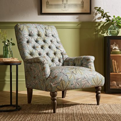 9b4500905a09a920b1e9394a775c92f71b63c06be408bd7dca9610268c12a0c0.jpg An Image of Bibury Button Back Chair Arboretum Print Arboretum Print
