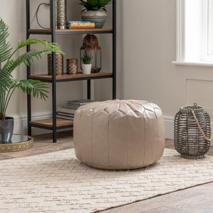 0b84c4d0b7929dd1f4541fafdc56c56738f0a10ef04a28ca326a9c7582ea2939.jpg An Image of Moroccan Stitched Pebble Pouffe Cream