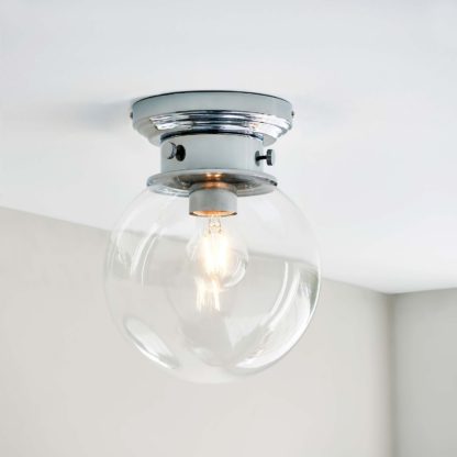 6bd01ab7b887e2ec2eaf470ba805988b4a9b8a6340e8b310c4ae986df84b944e.jpg An Image of Cheswick Bathroom Flush Light - Chrome