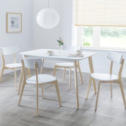 6e45b3fb7303d92b8bd059d487adf800645d3e29fccc5b53f0347ddd157a22d4.jpg An Image of Casa Set of 4 Dining Chairs White White