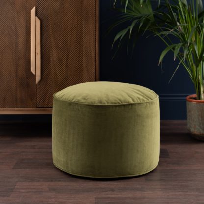 7157cb92c9f5fe94d469d37dc1bc70db151a4a899494b755ae64abf1021b3217.jpg An Image of Eliza Velvet Pouffe Cream