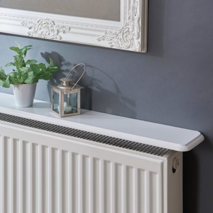 b23cfa93e54f07394f2eed4ac82d5b153cfe55e3bae0465204c998abd86f7691.jpg An Image of White Radiator Shelf White