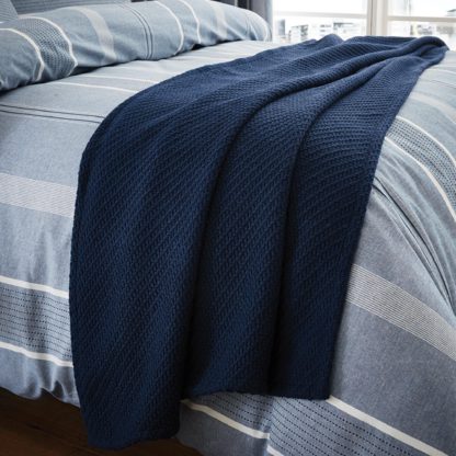 e45e1b4116c4699addd0d4ca1404aba137b710bdf523cf42a3ab938f1a2f094a.jpg An Image of Harvey Blue Knitted Throw Blue