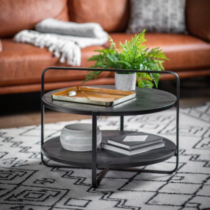 65cfb6bfab5a419f32c6f952daaf174de7fcfad08a462e19acb99e6e0b4b80e0.jpg An Image of Dalton Coffee Table Black