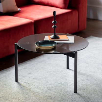 aee24682cf8ae6125591bd364585f0f7523349307c1519978e177bdc9ab5640d.jpg An Image of Hays Coffee Table, Glass Black