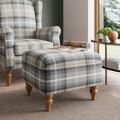 18e306258536a839312fd7a09483eb748050985b6249d32b699f95fb80389429.jpg An Image of Oswald Check Storage Footstool Tapered Leg Natural Oswald Wingback