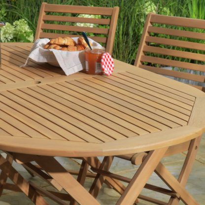 c8e88abcbab0d6b10aa6c6c16c874dccf8684e6d3597929016beff5b510782a6.jpg An Image of Argos Home Newbury Oval 6 Seater Garden Table - Light Wood
