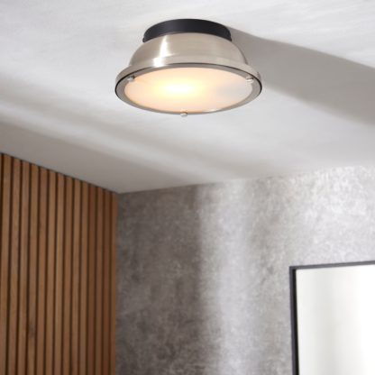 faa73b0af26ba64615fbeaaa42a038c911cf8b89583623a92b5a64ebb8232b41.jpg An Image of Barton Bathroom 1 Light Flush Ceiling Fitting Black