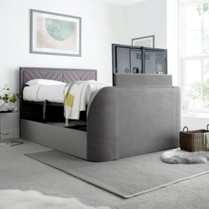 201f7eacb75e5a815b23d8f61481ed6d05aceecf5c07ac931cd4edf93109d738.jpg An Image of Sherlock Light Grey Velvet Ottoman Electric Media TV Bed Frame - 4ft6 Double