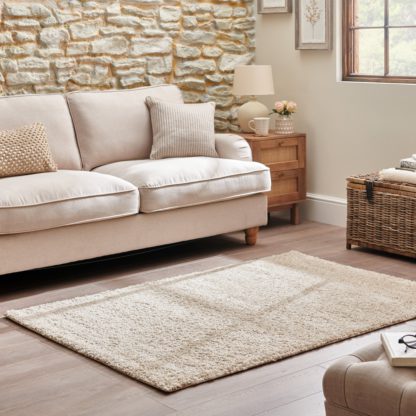 4913895fd9bb53ed5b5891e5322384b4fc802c45e4fb2eee0a1c1c6418142d44.jpg An Image of Lila Shaggy Rug Ivory