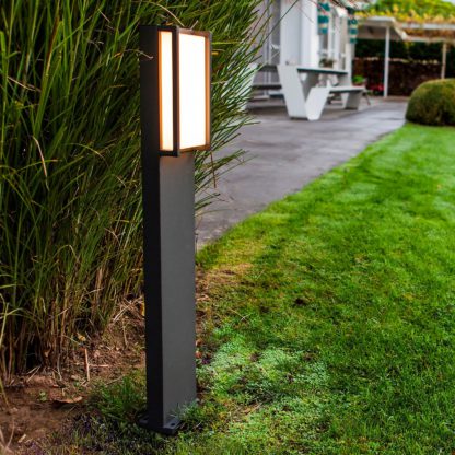5293b507a3a37ff41a960e8e5bdb8d47b062f3113f5bf5b0113e571ee8627814.jpg An Image of Lutec Qubo LED Bollard Light - Dark Grey