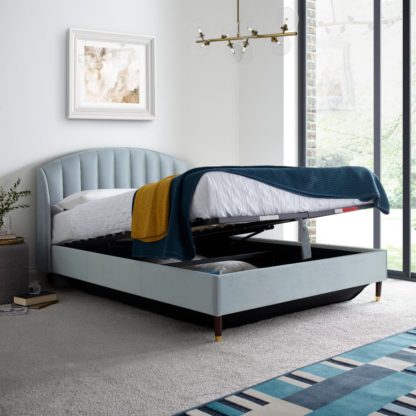 5a57abcc96cc607a2a72aa8b6999209fe803894ef679dd8b8cbab1c651acecb7-1.jpg An Image of Sandy Blue Velvet Ottoman Storage Bed Frame - 5ft King Size