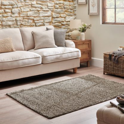 abe2f5e819933e7a5673b314ab79054cb6ef01c1048b569915ab9fb1251c9302.jpg An Image of Lila Shaggy Rug Ivory