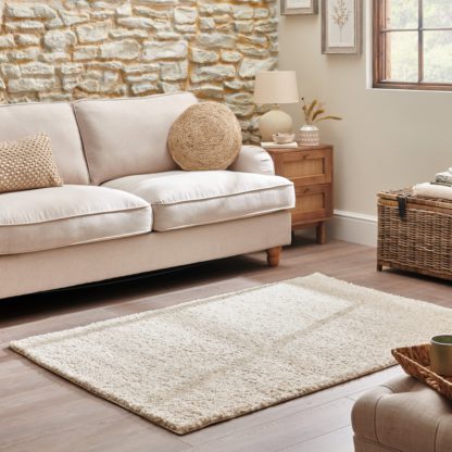 b1d3f01b5199cbbb8fa36e5f80c82bd9d26d616972becf8494cb3e3a96cb5b9f.jpg An Image of Lila Shaggy Rug Ivory