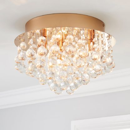 3161e23dfe0b15a41f5823c545c26fa3386d04f7599ffb32c113bdab692ec6df.jpg An Image of Torto Large Ceiling Fitting Rose Gold
