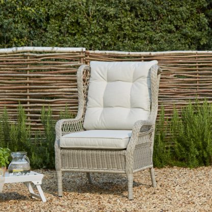 5821192cd3c47b79ba03231a730fa42a7a7d0a085a50cff072fe6e83fa16be85.jpg An Image of Churchgate Rattan Wingback Chair Grey