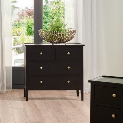 76c7953d8d467aad1584a7e3d4d72cfbc68d52c982fcd9eaee7bacee302d28c9.jpg An Image of Pacific Chelmsford 4 Drawer Chest, Black Painted Pine Black
