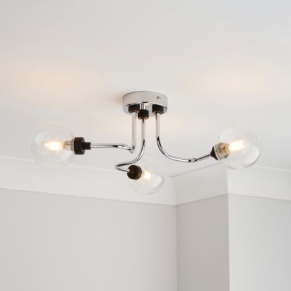 c82f7e19c70d4b8a03c72a76e9dfd4bdd914c01cff2deb6af5b9c37f387d9ebb.jpg An Image of Tanner 3 Light Semi Flush Ceiling Fitting Gold