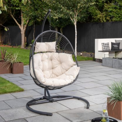 ee4ce6c1007a0b72e082c4442c1d07050c5be170c4427f91d9fc946e89da965b.jpg An Image of Singapore Black Hanging Egg Chair Black