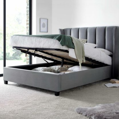 01e538fae49ca1b6e558812a0c6370e9e37b871357497bd01de279a2914782db-1.jpg An Image of Aurora - King Size - Ottoman Storage Bed - Grey - Velvet - 5ft