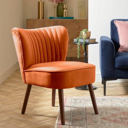 1d6853a99689f15acf6a3828633a012d2dccc29cf8a1cdd7e4d19ed1e4e25393.jpg An Image of Camille Velvet Cocktail Chair Camille Mineral Blue