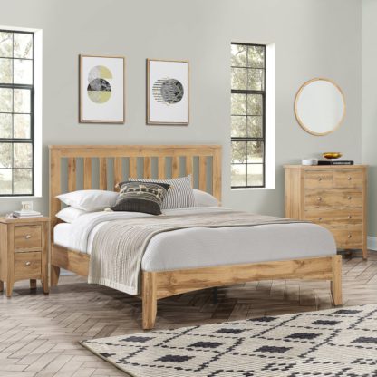 1dc65fe042f47bd102031899bbf32d7ddb6bed9c9e658ace5f975e7fd91968b3-1.jpg An Image of Hampstead Oak Wooden Bed Frame - 4FT6 Double