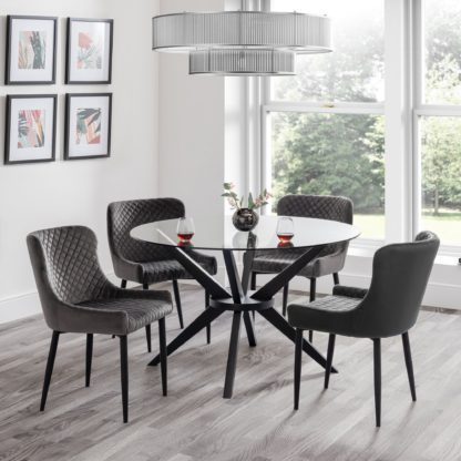 48cb343d81d841c1ccbfff713614db494ebebb5c10ca3b3fbe85b1fff1e35e09.jpg An Image of Hayden Round Glass Dining Table Black