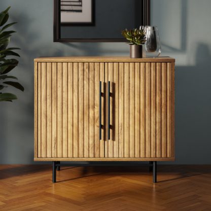 6fece41e2c9477538abc44a2fe35b53e283232c44e7687daf7bdda4fc79bdbb5.jpg An Image of Bryant Compact Sideboard Wood (Brown)