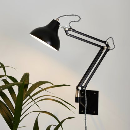 9f805bd3d12cdc2036d0676062a7af18e3faf667c3e765375d0a122de89868b3.jpg An Image of Archibald Articulated Black Wall Light Black