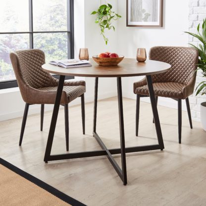 a14d576935d04389f0055e8a36721ce5d4c12fe4f43b2eb33c9cb0e2610054f8.jpg An Image of Brayden Round Dining Table Black