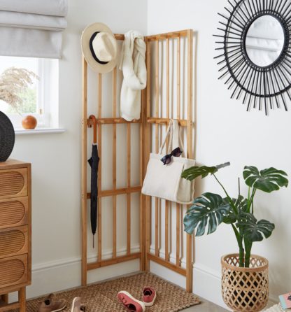 6c4871c3ffc59009c327171c185f66bebb1c475ce368423d7119ebf33ada03dd.jpg An Image of Bamboo Corner Coat Stand Natural