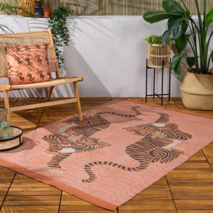 7c1fa87a2f141d2825b8f47acbcfcfeb3de826383bf9474e1693d9b005090273.jpg An Image of furn. Tibetan Tiger Coral Washable Indoor Outdoor Rug Orange