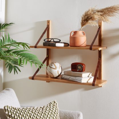 890fc65498f5222b79e0b5407b3779197c0d5d5a8272324f8cd45e297fa5905d.jpg An Image of Artisan Wall Shelves with Leather Straps Natural